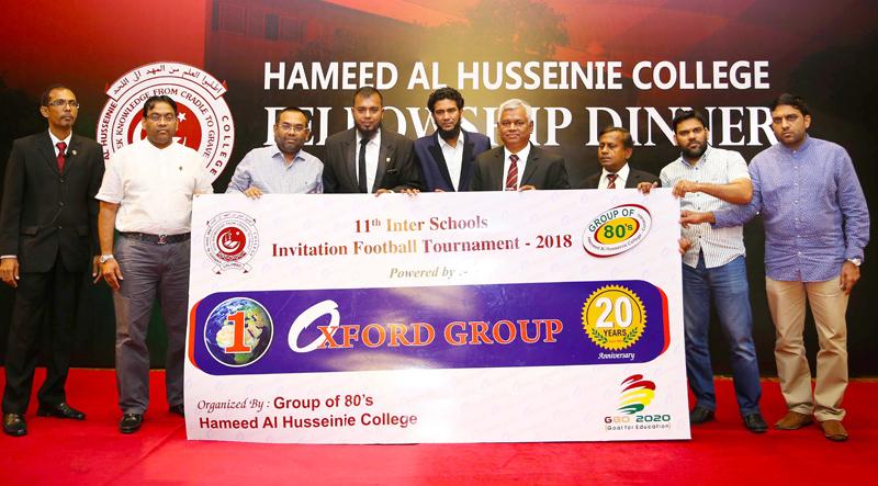 Directors of Oxford Group and Old Boys of Hameed Al Husseinie College brothers Imthiyas Farook, Roshan Farook, Hifas Farook and Shamil Farook presenting the sponsorship to the organizers of the Invitation Schools soccer Tourney. 