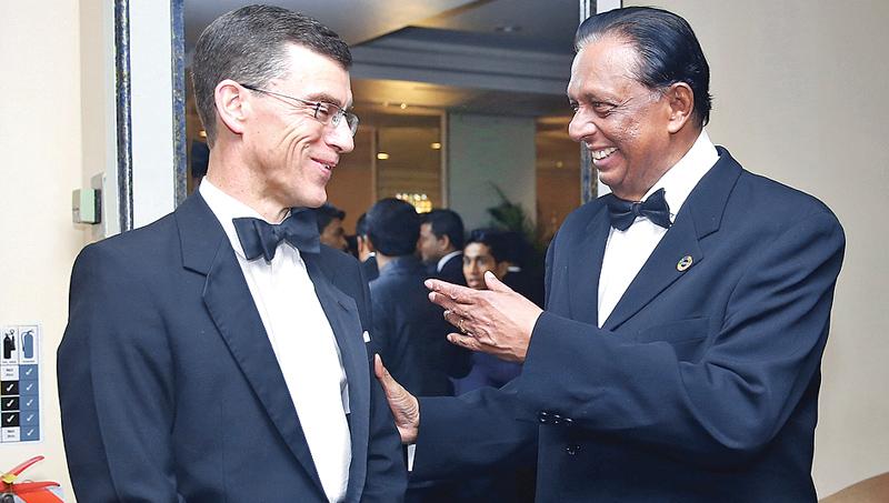 British High Commissioner in Sri Lanka James Dauris shares a light moment with Minister Amaratunga   