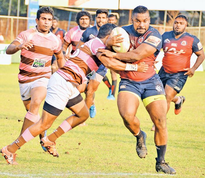 Action in the keenly fought out Dialog ‘A’ division rugby match between Havelocks SC and CR&FC at Longden Place yesterday.  Pic by Saman Mendis