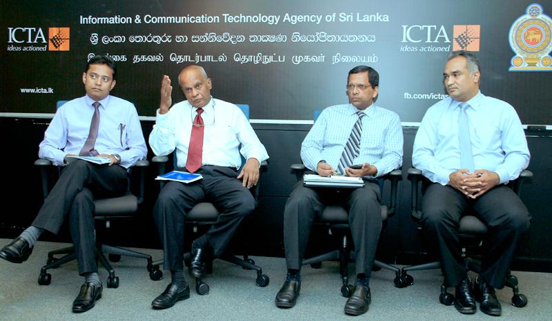 ICTA CEO (Acting) Dr. Ajith Madurapperuma (second from left) addressing the media. Officials of ICTA are also in the picture. 