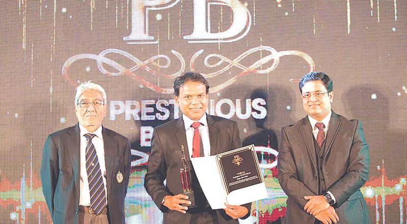 From left: President of India Thai Business Association, Satish Segal, Maliban CEO Ravi Jayawardena, and CEO Brand Advertising Research Consulting,  Saimik Sen at the awards ceremony.   