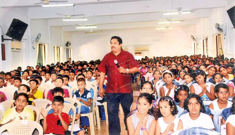 Dr Rajiva Perera delivering his lecture