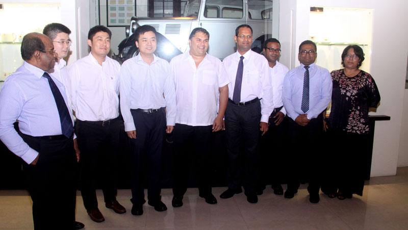 Galle Face Group Chairman Sanjeev Gardiner, Galle Face Hotel Management Senior Vice President Chandra Mohotti with senior officials from Zhen Hua Engineering Company Limited in Colombo. Pic: Chaminda Niroshana