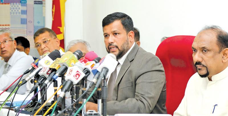 Leader of ACMC Rishad Bathiudeen addresses the media with ACMC MPs and officials