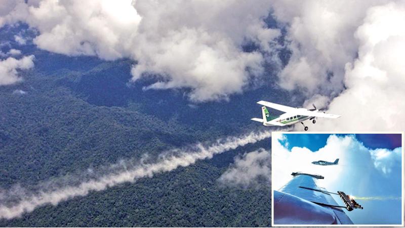 Cloud seeding material being  fired from an aircraft's wing Image courtesy : Jim Brandenburg/Minden Pictures/Newscom