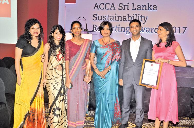 Women executives share joy after their company, John Keells Holdings was adjudged the winner in the Conglomerates and Diversified category during the ACCA Sustainability Reporting Awards last week. Pic: Vipula Amerasinghe 