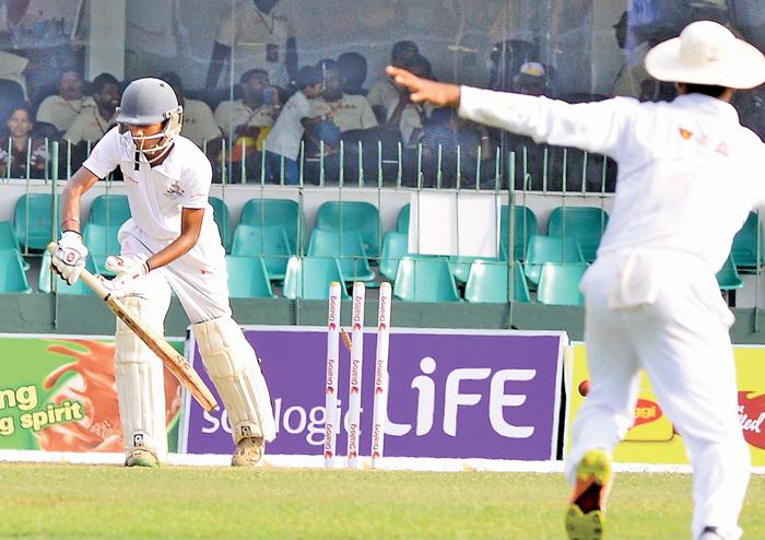 Nalanda batsman Dilhara Polgampola is bowled by Ananda’s Shyamal Hirushan on the opening day of their Battle of the Maroons Big Match at  SSC ground yesterday (Picture by Saman Mendis)