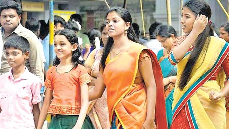 Devotees heading towards the kovil