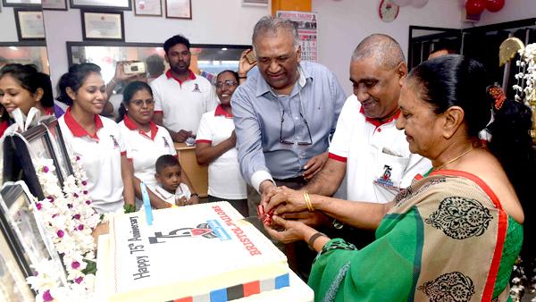 Here Chaandana Wijesekera (Centre) cuts the cake along with Tony Wickremasinghe and Olga Perera, two of the children of founder, the late Vincent Charles Wickremasinghe