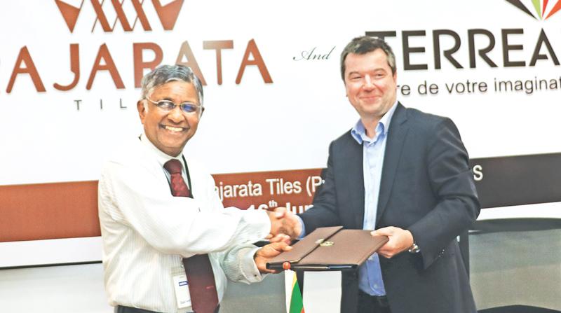 The signing of the MoU: From left - Group Managing Director, DSI Samson Group, Kulatunga Rajapaksa and Chief Executive Officer, Terreal Group,  Laurent Musy.  