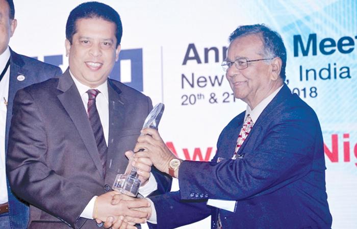  Lakshman Silva,  CEO, DFCC Bank receiving the award for the “Best Annual Report” from Dr. Sailendra Narain, Honorary Member, ADFIAP at the 41st Annual Meeting of ADFIAP.  