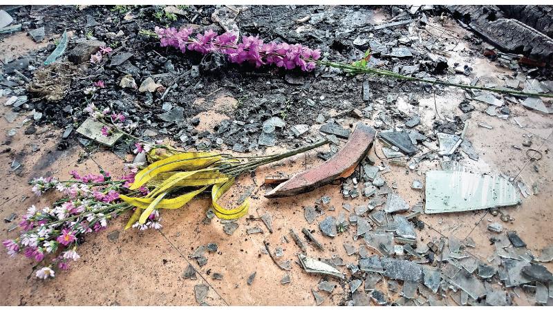 Flowers made of cloth survived the fires that consumed a house