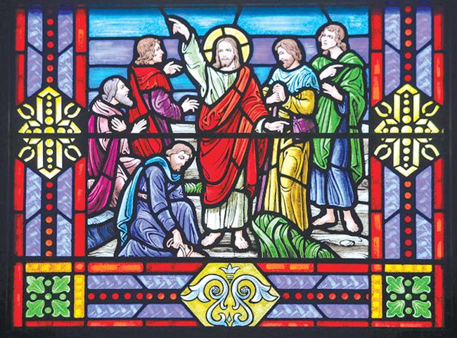Stained glass at First Congregational Church on North K Street in Lake Worth showing the resurrected Christ