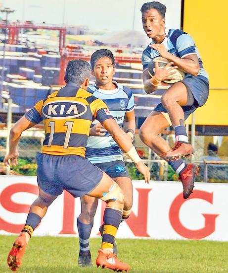 Wesley College winger Paranathiran Mohandas catches a highball in their disrupted match against Royal College Pic: Saman Mendis 