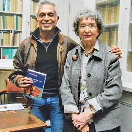 Ashok Ferrey (left) at the publishers’ with Editor Marie-Pierre Bey