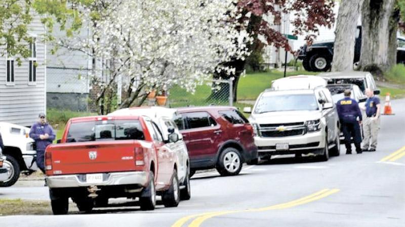 Homes around Summer and Pleasant streets in Skowhegan were evacuated while police from several agencies investigated homeowner Philip Ewing at nearby 15 Summer St. after explosive-making materials were discovered Sunday.                                                                              Pic. David Leaming     