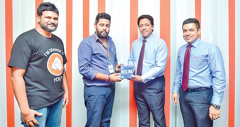 From left: ORELIT Head of IT, Charith Jayanetti and Vice President Upendra Peiris with Singer Sri Lanka Director Operations, Chandana Samarasinghe and Manager, Corporate Sales Waruna Wickramasinghe.  