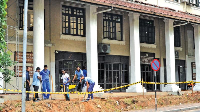 Navy personnel working round-the-clock to ensure that the building is ready by next month (Pic: Susantha Wijegunasekara)