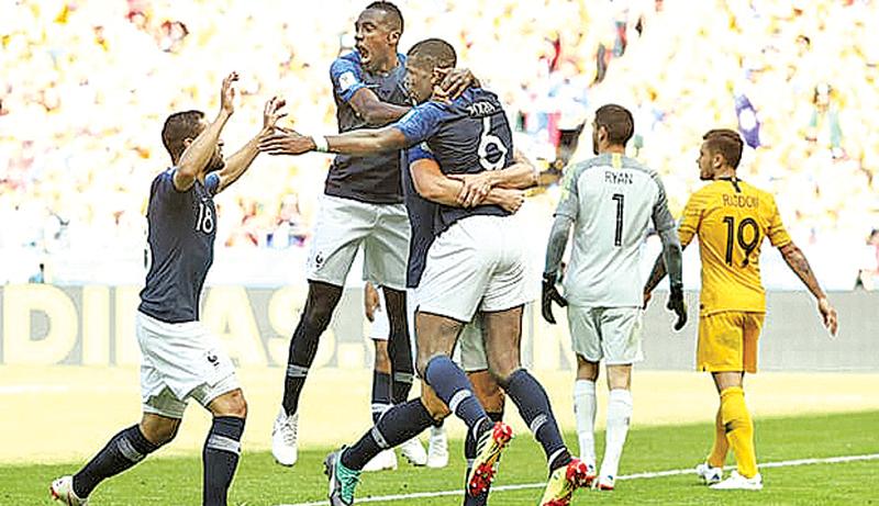 France’s players celebrate a goal against Australia
