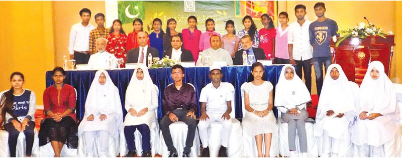 Students with the chief guest and guest of honour.  