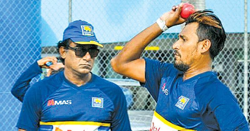 Suranga Lakmal practices with a pink ball ahead of the match    