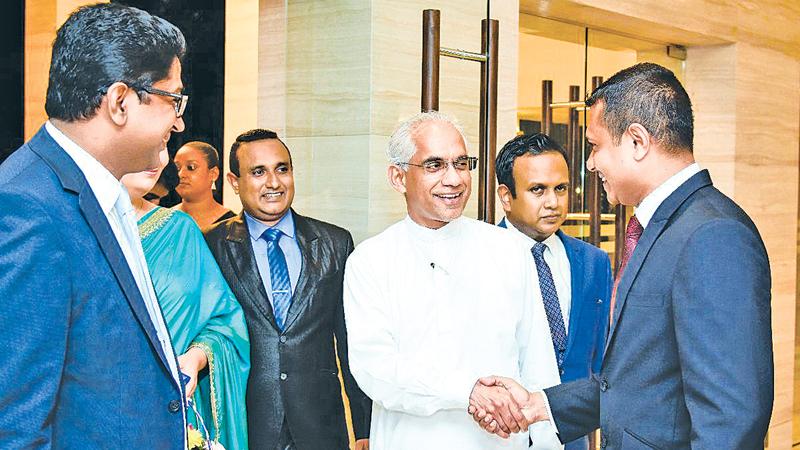 Chief guest State Minister of Finance, Eran Wickramaratne with company officials. Pic: Chaminda Niroshana