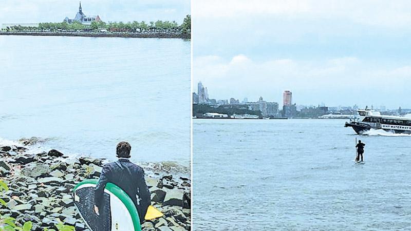 Holt was running late for his meeting and decided to hop on his paddle board to cross the river faster.