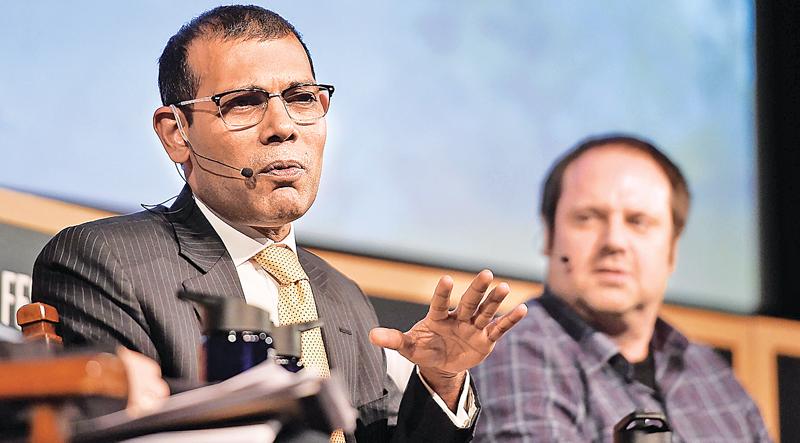 Former President of the Maldives Mohamed Nasheed speaks on stage at the New Climate Lunch Roundtable on day 4 of the 2017 Sundance Film Festival at Wahso Asian Grill in Park City, Utah. - AFP PHOTO