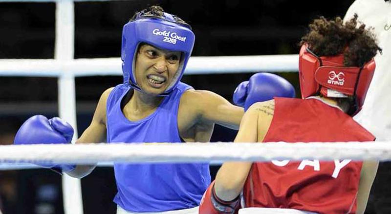 Anusha Kodithuwakku lands a straight-left on her opponent