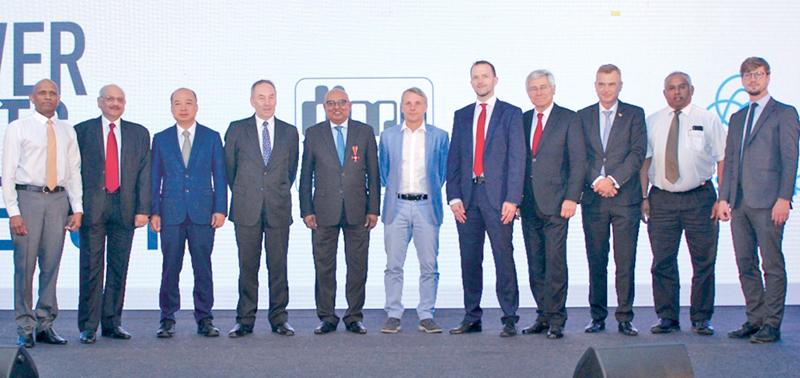 From left: DIMO Director Wijith Pushpawela, thyssenkrupp Director Export Sales, Naveen Ratna, thyssenkrupp Business Development Director Ben Mo and Vice President Special Projects Ian Smith, DIMO Chairman and Managing Director Ranjith Pandithage, German Ambassador in Sri Lanka His Excellency Jörn Rohde, thyssenkrupp Commercial Head Worldwide Distributor Business Christoph Karges and Senior Advisor thyssenkrupp Guenther Rittner, The Delegate of German Industry and Commerce in Sri Lanka Andreas Hergenroether 