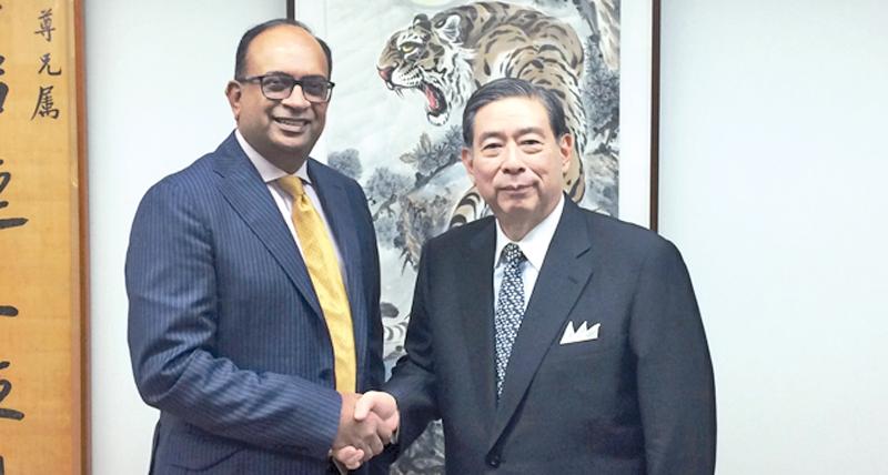 Sunshine Holdings Group Managing Director Vish Govindasamy with SBI Holdings President and CEO Yoshitaka Kitao after the  conclusion of the private placement in Tokyo on July 3.   