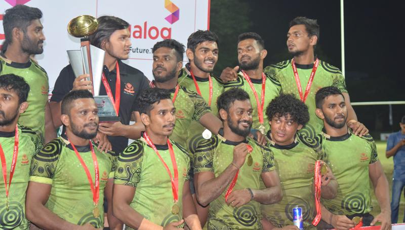 Back row from left: Anuradha Herath, Rohitha Rajapaksa (captain), Mohamed Rizwan, Naveen Hemakankanamge, Ruwan Kumara and Hirantha Perera. Front row from left: Ashan Maduranga, Sasanka Ariyaratne, Lahiru Chinthaka, Sudham Suriyarachchie, Sudharshana Muthuthantri and Nishon Perera after pocketing the inter club rugby Sevens trophy     