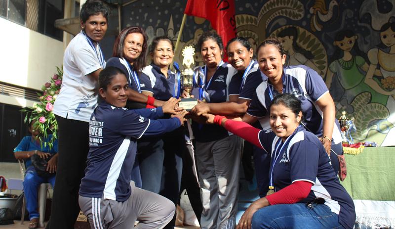 The champion Meththa team comprising Udayangani, Shiromi, Dilani, Sadali, Hansi, Nisansala and Jayathri pose with their trophy presented by distinguished old girl Rohini Yapa