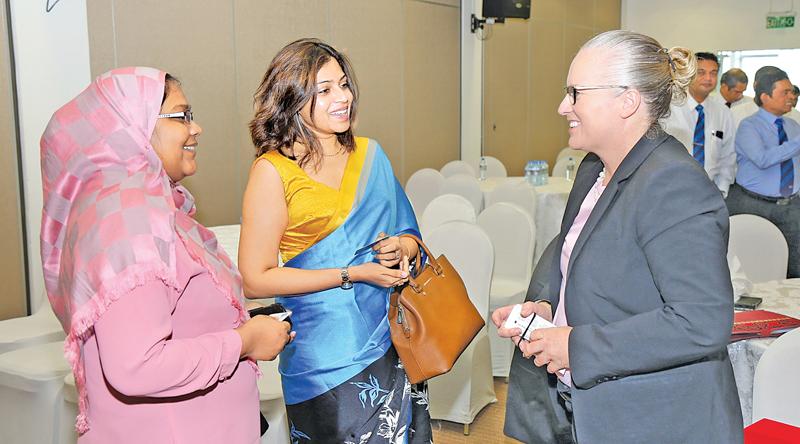  IFAC President Rachel Grimes in conversation with members of CA Sri Lanka during the forum.     