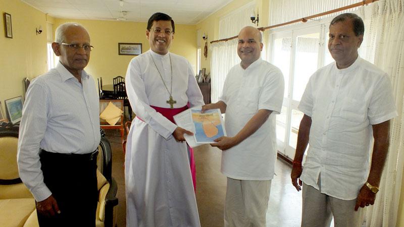 Here Milinda Moragoda with Urumayake Ulpatha Chairman Lalith Weeratunge and General Secretary R.A.D. Sirisena presenting a copy of the Agenda to the Bishopof Colombo, His Lordship Dhiloraj Canagasabey.
