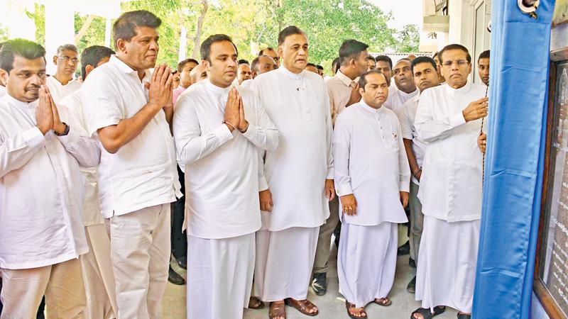 President Maithripala Sirisena opens the new building at Manampitiya Hospital. Western Province Chief Minister Isura Devapriya, Eastern Province Governor Rohitha Bogollagama, Mahaweli Development State Minister Weera Kumara Dissanayake, and Deputy Environment Minister Ajith Mannapperuma were also present