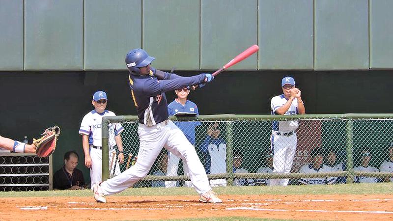 Akalanka Ranasinghe swings his bat