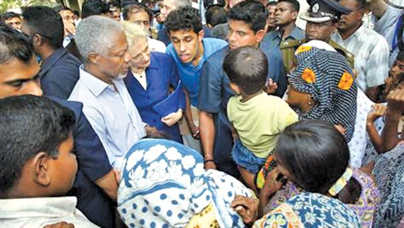 Picture of Kofi Annan at a makeshift camp for those affected by the  tsunami in Trincomalee on January 8, 2005.     