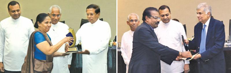 President Maithripala Sirisena and Prime Minister Ranil Wickremesinghe presenting awards to institutions with a high level of performance based on COPA evaluation for financial year 2015