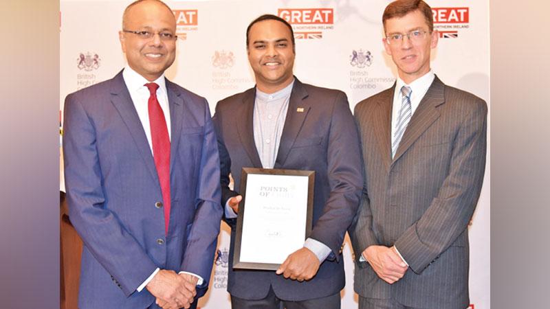 Prashan De Visser with British High Commissioner in Sri Lanka James Dauris and Minister for Southern Development and Youth Affairs Sagala Ratnayake.