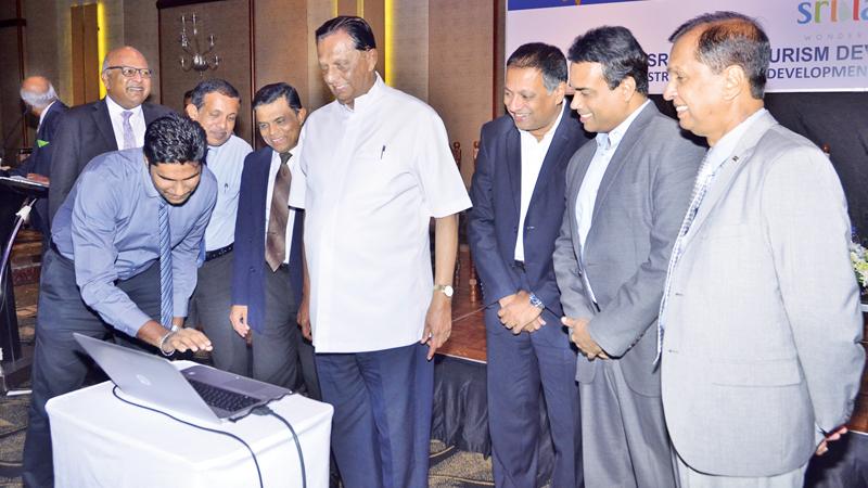 Minister John Amaratunga launches the website of Sri Lanka Tourism Awards 2018.  Pic: Vipula Amarasinghe