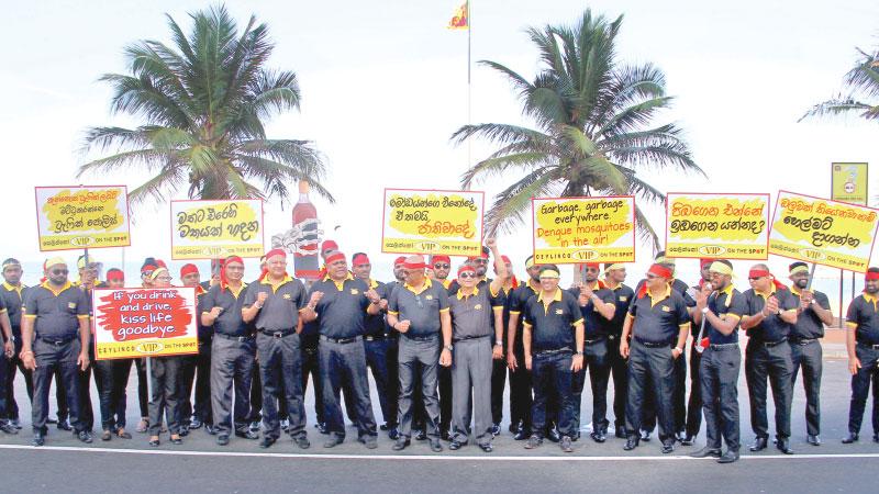 Right way on the highway – Over 1,700 staffers of Ceylinco General Insurance took to the streets in several areas in Colombo on Friday with a unique campaign to educate people and road users on deteriorating civic values and to say NO to child abuse, drug use and sexual  violence. The program will be conducted islandwide. (Pic: Sulochana Gamage)  