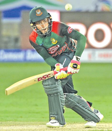 Bangladeshi batsman Mushfiqur Rahim plays a shot during the one day international (ODI) Asia Cup cricket match against Sri Lanka at the Dubai International Cricket Stadium  AFP)