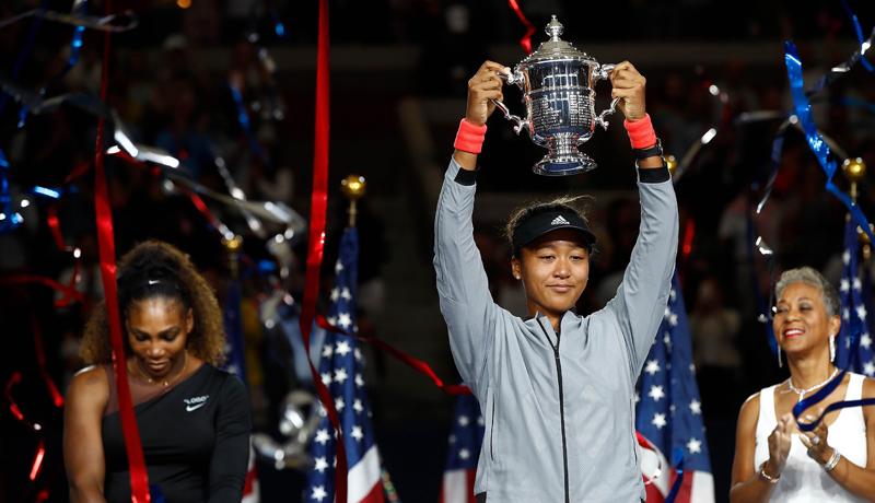NEW YORK: Naomi Osaka of Japan poses with the championship trophy after winning the US Open AFP