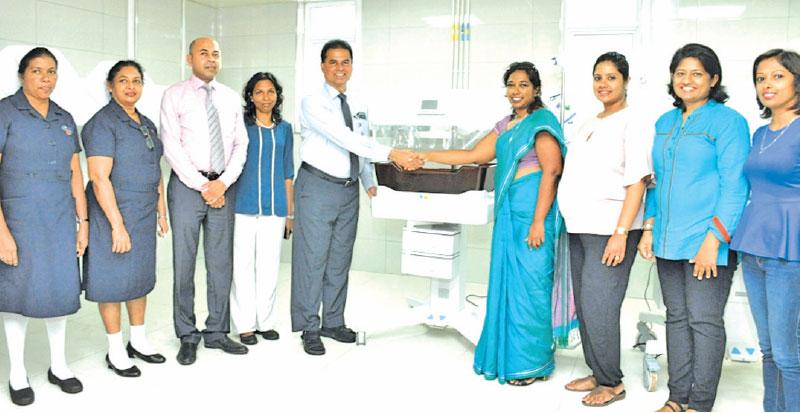 Handing over of the medical equipment purchased with funds from the ‘Little Lives’ fundraiser at the new building of the De Soysa Hospital for Women: From left Special Grade Nursing Officer W.D.P.L. Jeewandara, Special Grade Nursing Officer M.M.D. Dinesha Tharangani, Consultant Neonatologist Dr. Nalin Gamaathige, Consultant Neonatologist Dr. Nishani Lucas and Director Dr. Sudath Dharmarathna from DSHW and Dr. Ashwini de Abrew, Thushanthi Ponweera, Amila Jayamaha and Marianne David from the ‘Little Lives’ te