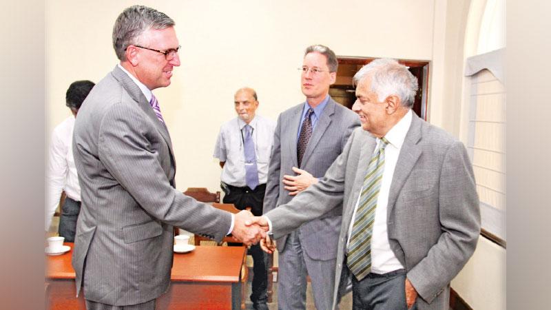 MCC COO Jonathan Nash and Chargé d’affaires ad interim Robert Hilton greets Prime Minister Ranil Wickremesinghe