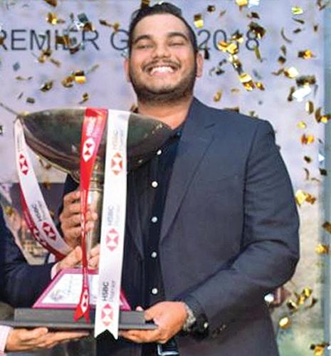 Sachin de Silva poses with his trophy