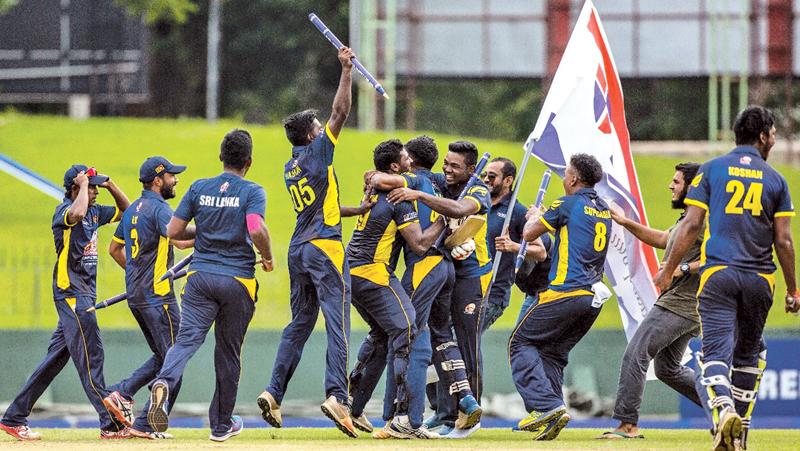 Sri Lankan players celebrate victory