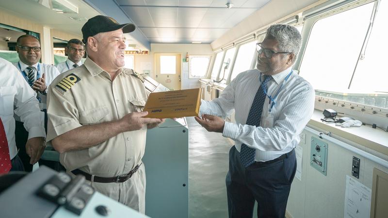 Captain Filipov Genchev with CEO of Hambantota International Port Services (HIPS), Ravi Jayawickrama exchange a welcome plaque commemorating this inaugural visit. K-Line local agent, Executive Director of ABC shipping (Pvt) Ltd. Roshan Dissanayake and his team were also present.   