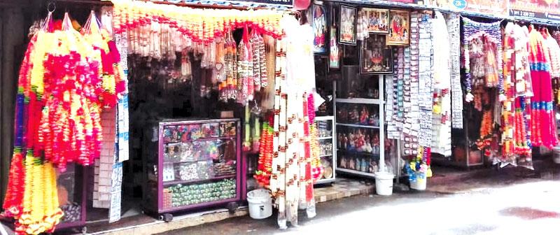 A mix of natural and artificial garlands adorn the stalls of Sea Street